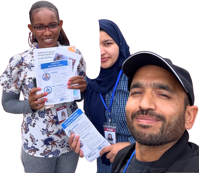 Three FIRM outreach workers wearing staff badges, holding know-your-rights information sheets in English and Spanish.